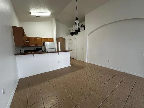 a view of a kitchen with a sink