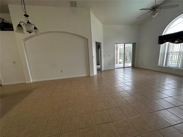 a view of a livingroom with a staircase