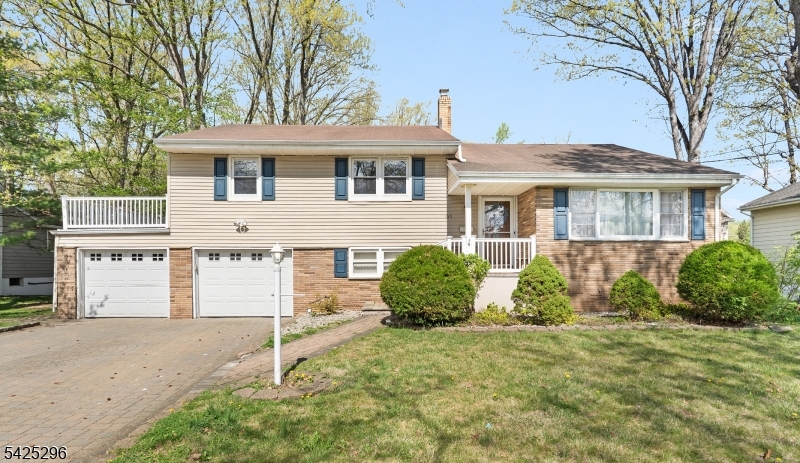 156 Wentz Avenue Springfield, NJ 07081 - Photo 1 of 27 front view of a house with a yard