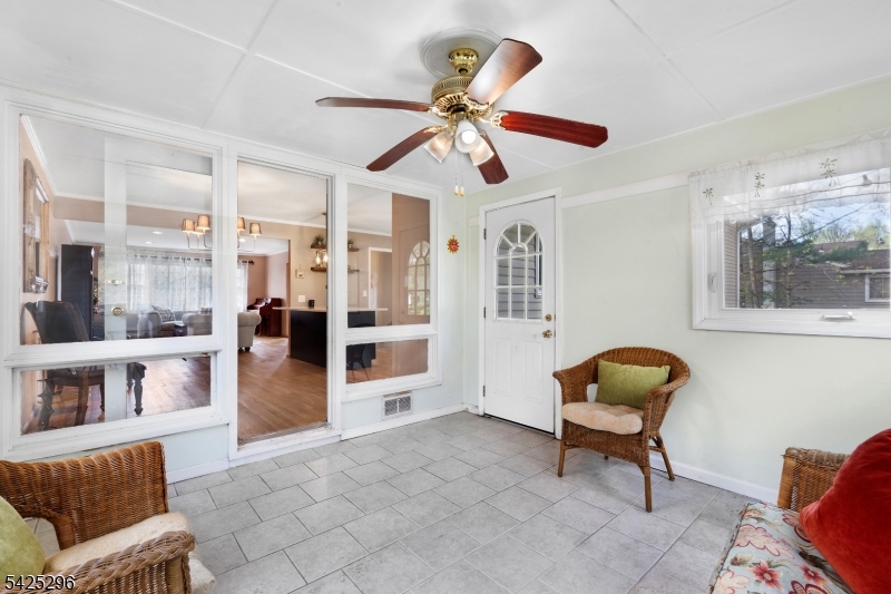 156 Wentz Avenue Springfield, NJ 07081 - Photo 11 of 27 a living room with furniture and a window