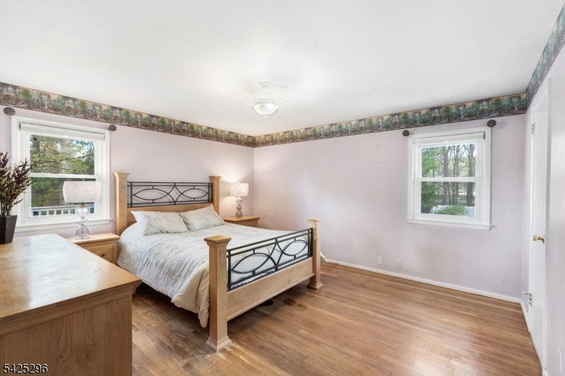 156 Wentz Avenue Springfield, NJ 07081 - Photo 12 of 27 a bedroom with a bed and window
