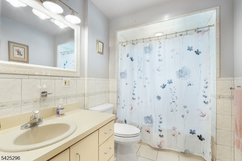 156 Wentz Avenue Springfield, NJ 07081 - Photo 17 of 27 a bathroom with a sink toilet and shower