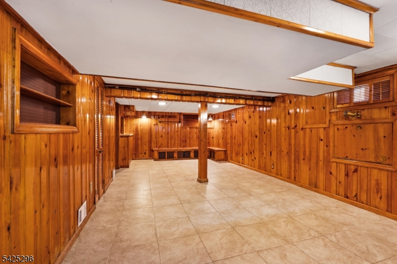 156 Wentz Avenue Springfield, NJ 07081 - Photo 20 of 27 a view of an empty room with wooden walls