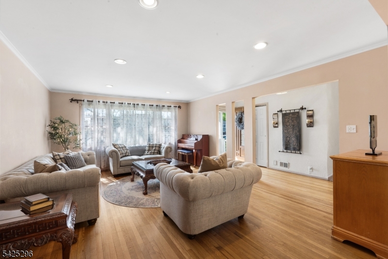 156 Wentz Avenue Springfield, NJ 07081 - Photo 3 of 27 a living room with furniture and a large window