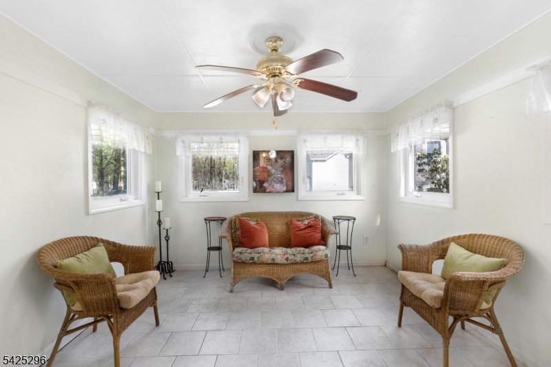 156 Wentz Avenue Springfield, NJ 07081 - Photo 10 of 27 a living room with furniture and a window