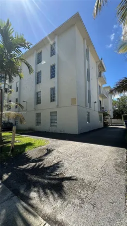 a street view with a building in the background