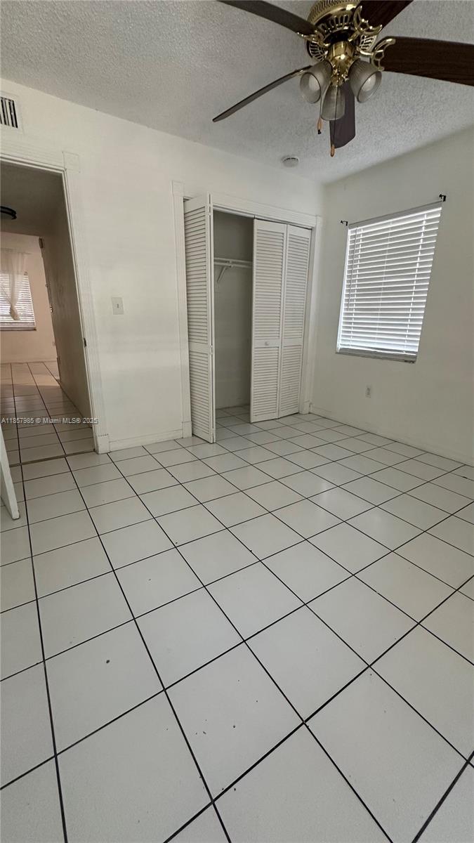 2138 Southwest 6th Street, Unit 102 Miami, FL 33135 - Photo 2 of 11 a view of an empty room and window