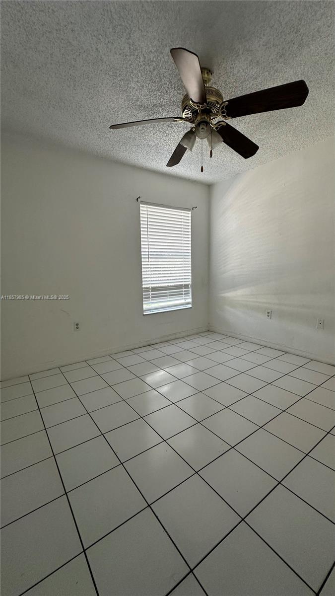 2138 Southwest 6th Street, Unit 102 Miami, FL 33135 - Photo 3 of 11 a view of an empty room and window