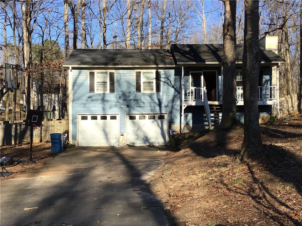 35 Davis Mill Hollow Dallas, GA 30157 - Photo 1 of 1 a view of a house with a snow on the road