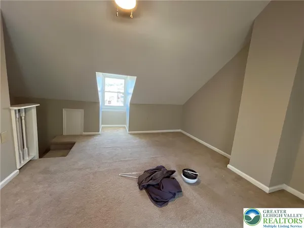 a bathroom with a sink a toilet and bathtub