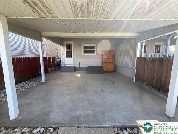 a view of a backyard of the house