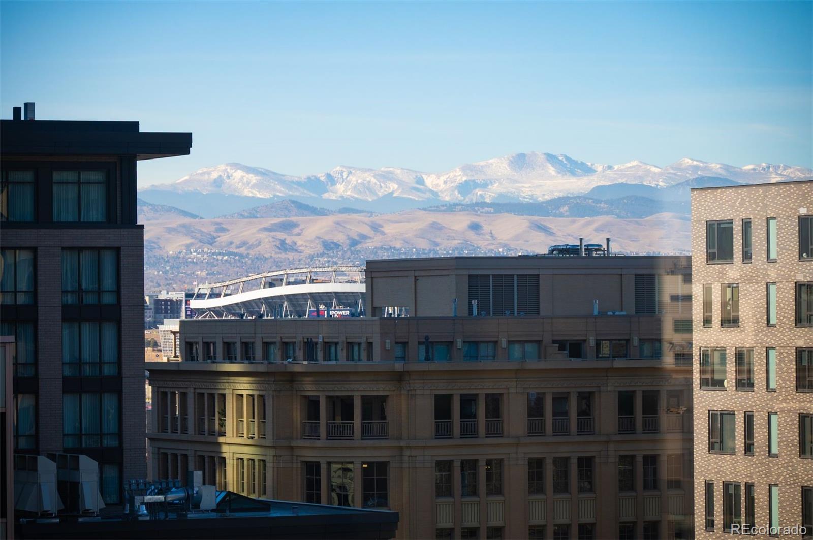 1777 Larimer Street, Unit 1010 Denver, CO 80202 - Photo 2 of 48 a view of a large building with a city view