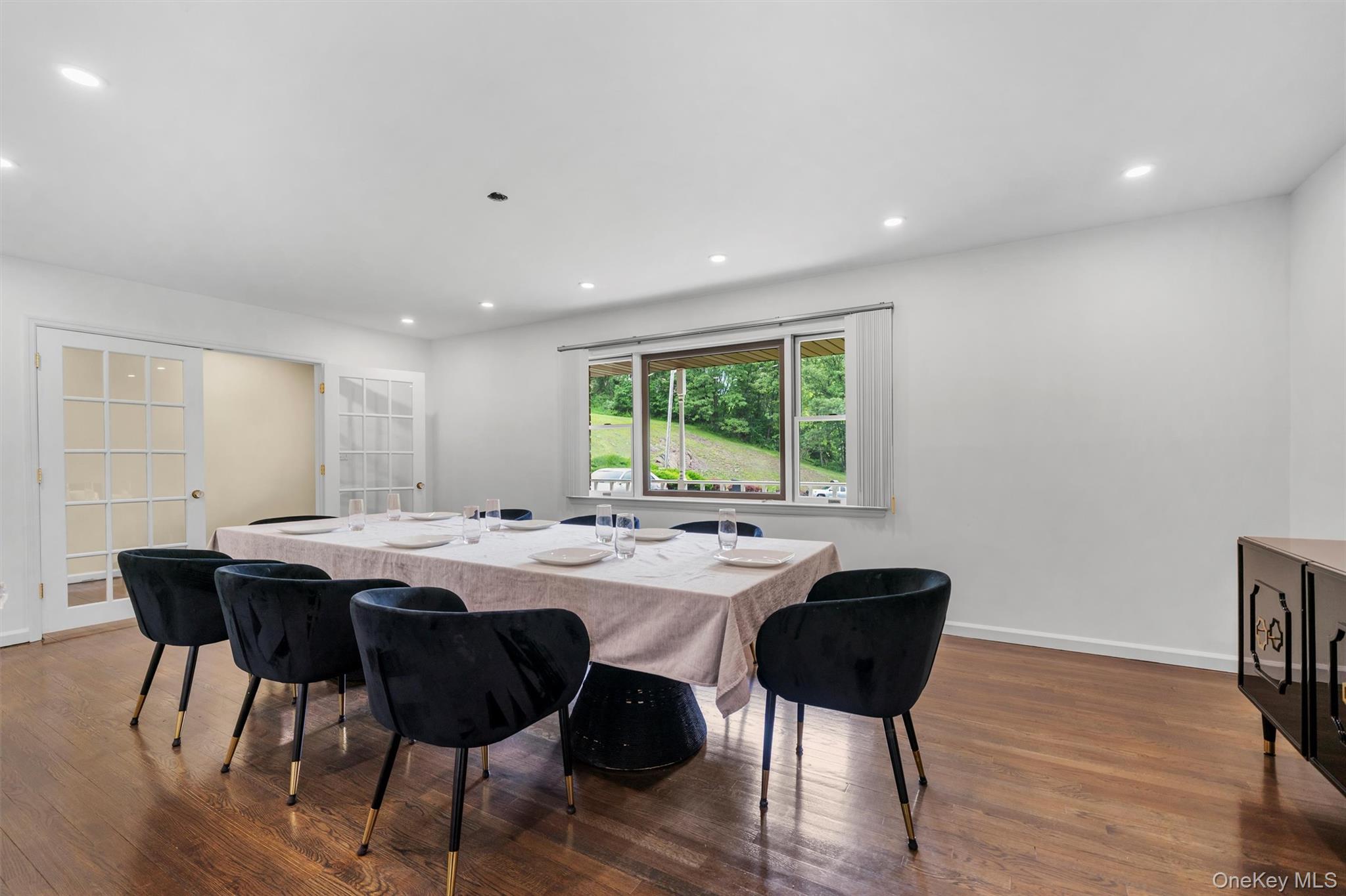 14 Cheesecote Court Stony Point, NY 10980 - Photo 11 of 40 a view of a dining room with furniture and wooden floor