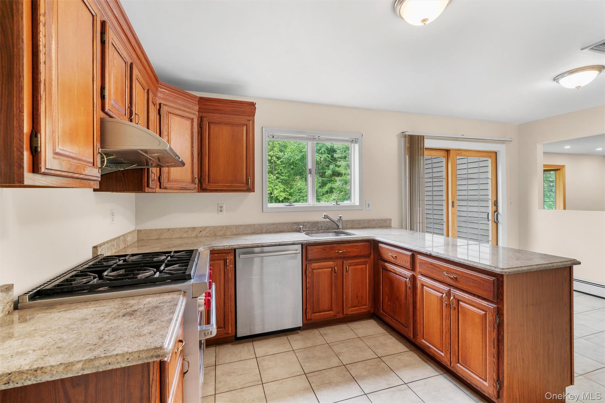 14 Cheesecote Court Stony Point, NY 10980 - Photo 16 of 40 a kitchen with stainless steel appliances granite countertop a stove a sink and a microwave