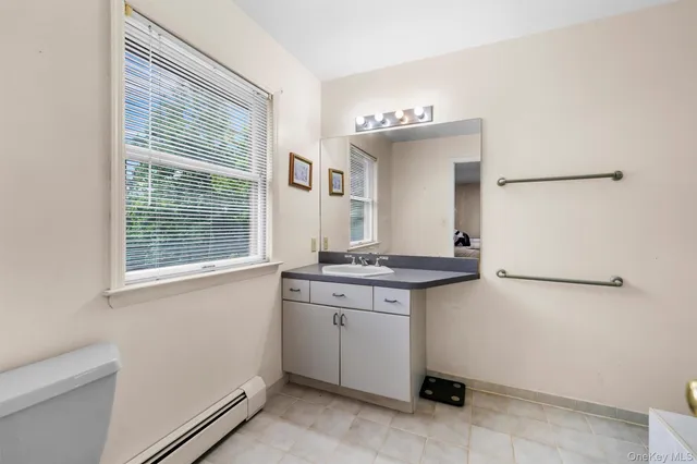 a kitchen with a sink and a refrigerator