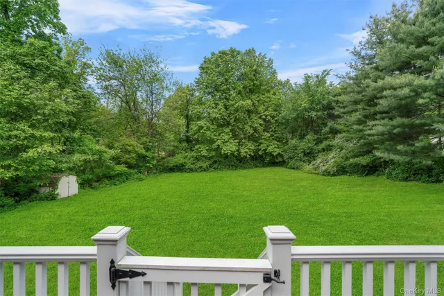 a view of a garden and basketball court
