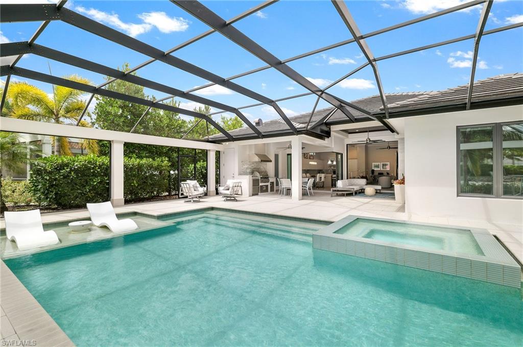 17441 Via Lugano Court Miromar Lakes, FL 33913 - Photo 22 of 40 a view of swimming pool with a patio