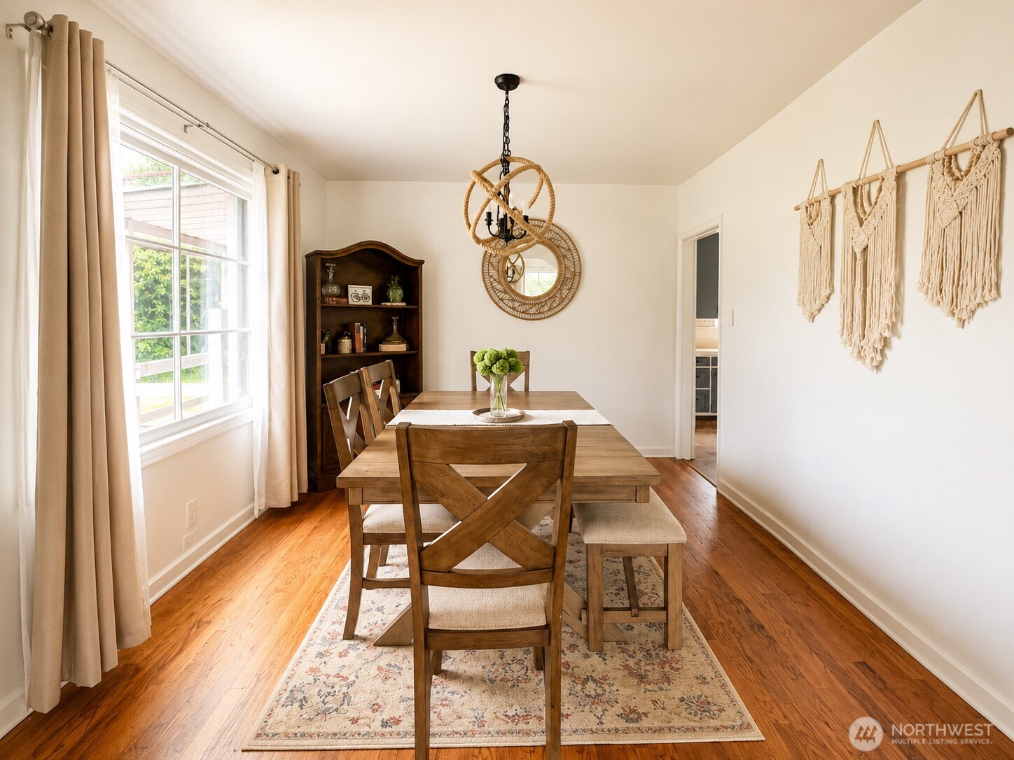 2154 Cranberry Road Grayland, WA 98547 - Photo 11 of 38 a view of a dining room with furniture window and wooden floor