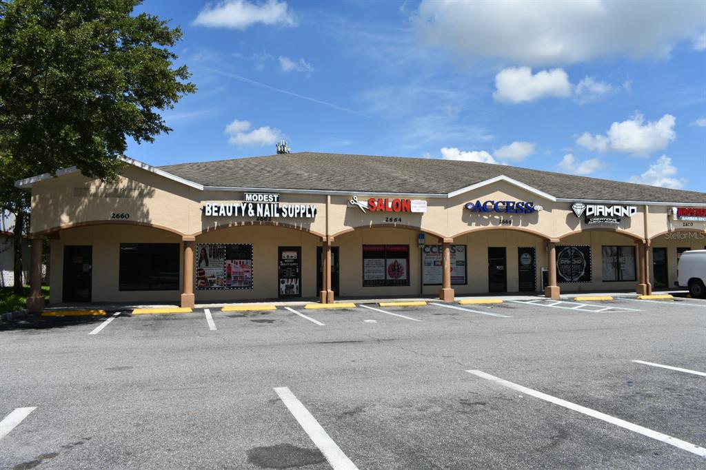 2666 Simpson Road Kissimmee, FL 34744 - Photo 2 of 3 a front view of a building with street view