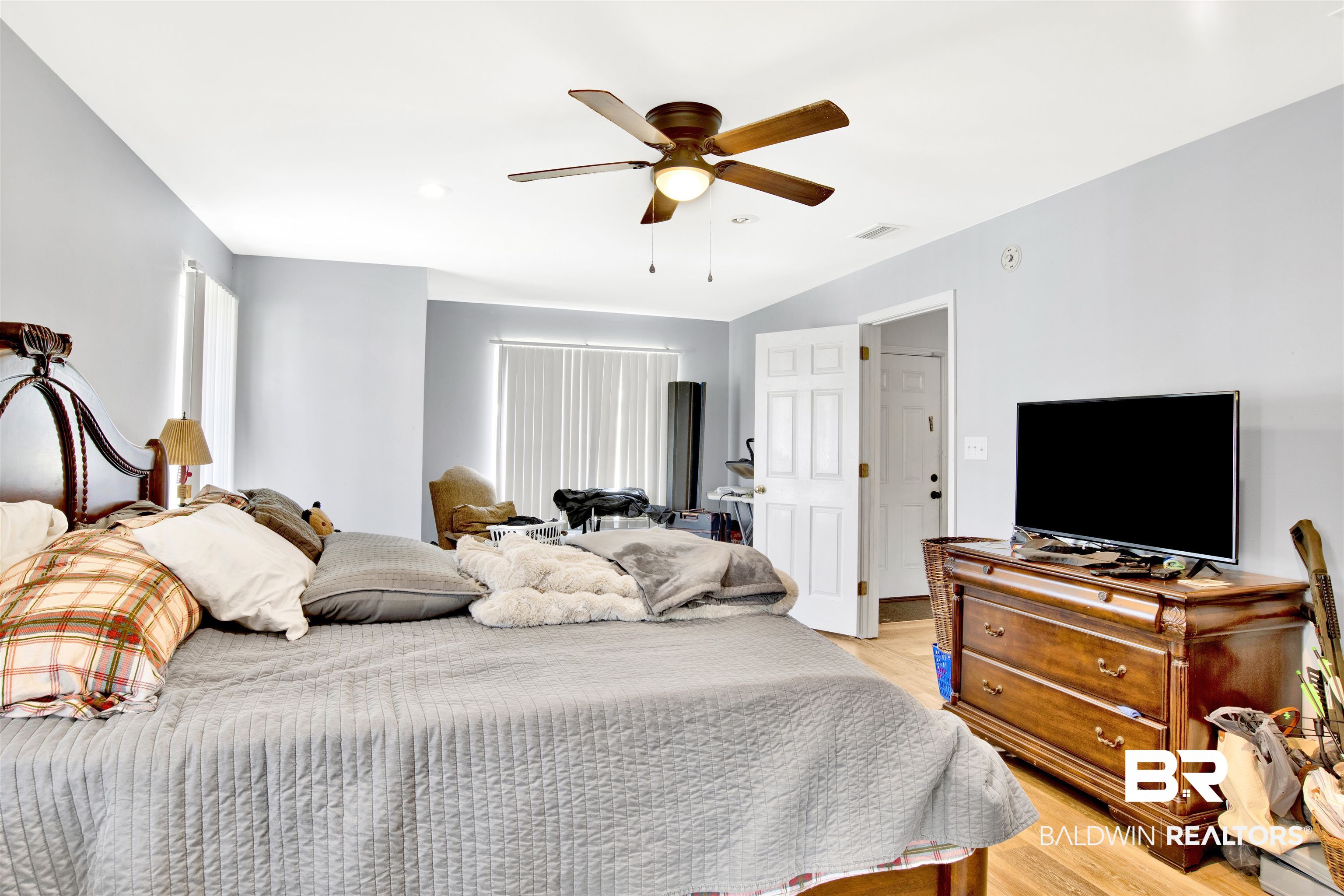 24384 Sailfish Lane Orange Beach, AL 36561 - Photo 14 of 23 Bedroom with ceiling fan and light hardwood / wood-style floors