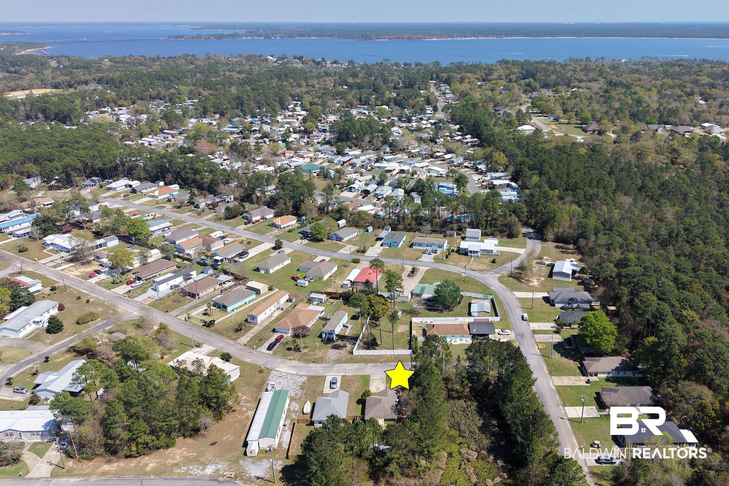 2000 Maria Lane Lillian, AL 36549 - Photo 32 of 35 Aerial view of residential area featuring a nearby body of water