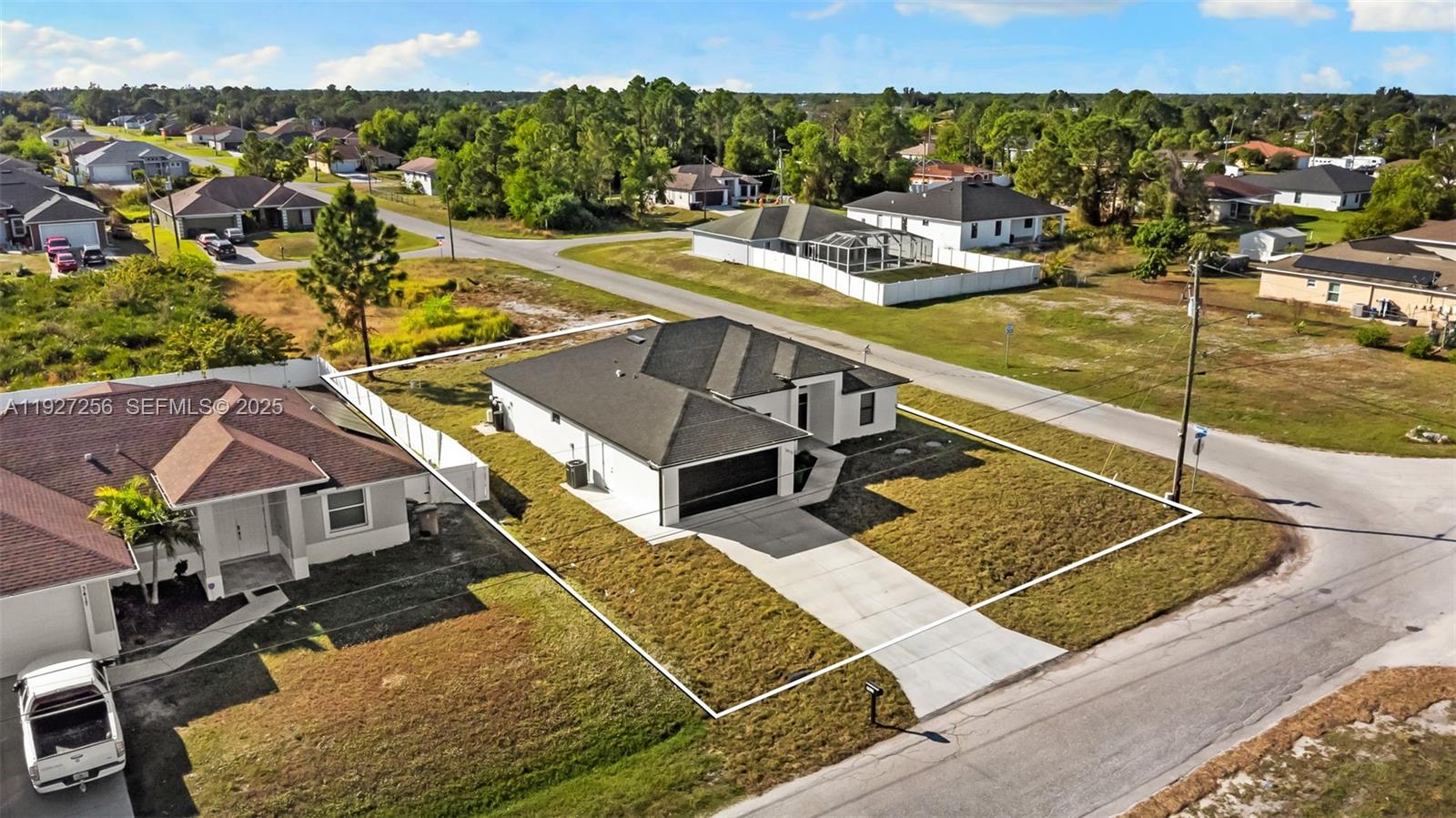 3419 16th Street Southwest Lehigh Acres, FL 33976 - Photo 32 of 46 a view of a swimming pool with a patio