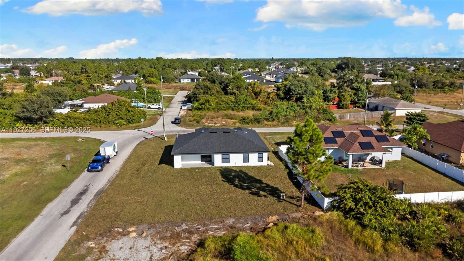 3419 16th Street Southwest Lehigh Acres, FL 33976 - Photo 37 of 46 a view of a city with an ocean view
