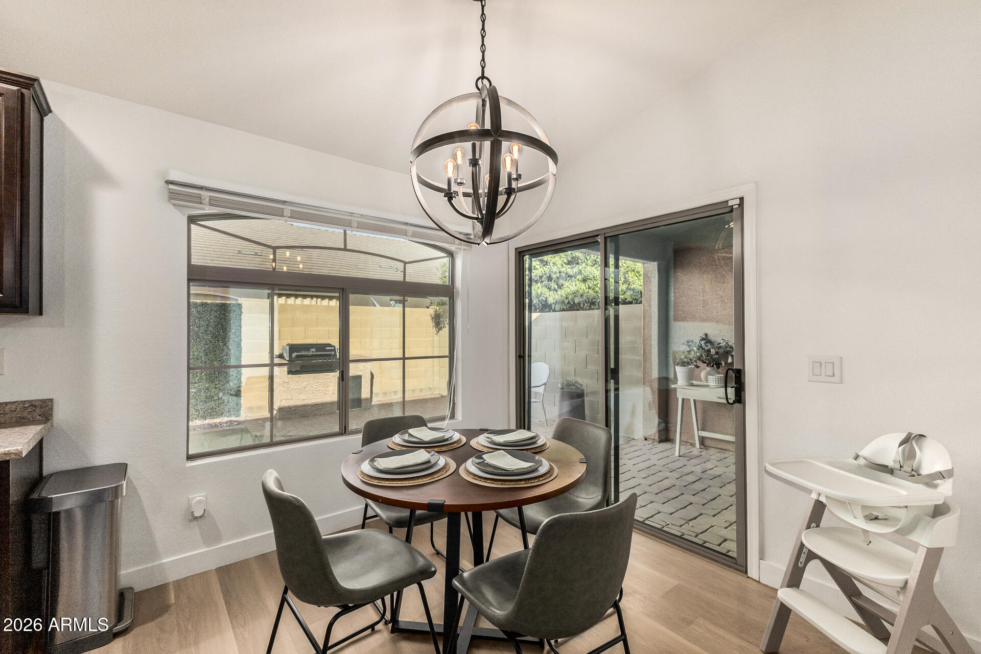 2725 East Mine Creek Road, Unit 1101 Phoenix, AZ 85024 - Photo 11 of 43 a view of a dining room with furniture window and outside view