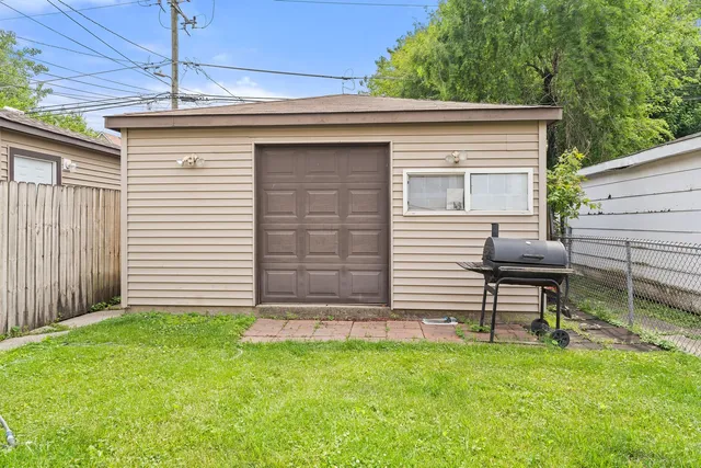 a view of a backyard with a garden