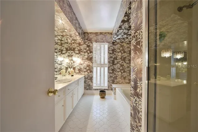 a bathroom with a double vanity sink and mirror