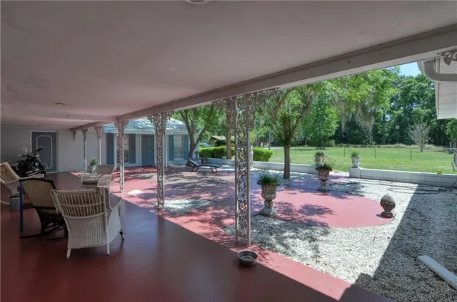 a view of a back yard of the house