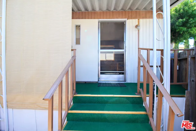 a view of an entryway with a swimming pool