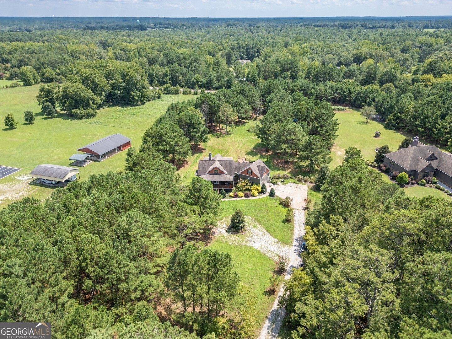 3011 Old Mill Road Rutledge, GA 30663 - Photo 1 of 1 a view of a lake with a yard