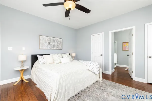 a view of a field with trees in the background