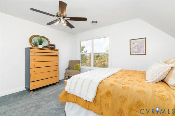 a view of a lake with a yard