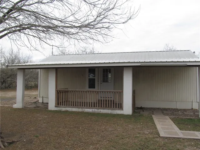 a view of a house with a roof deck