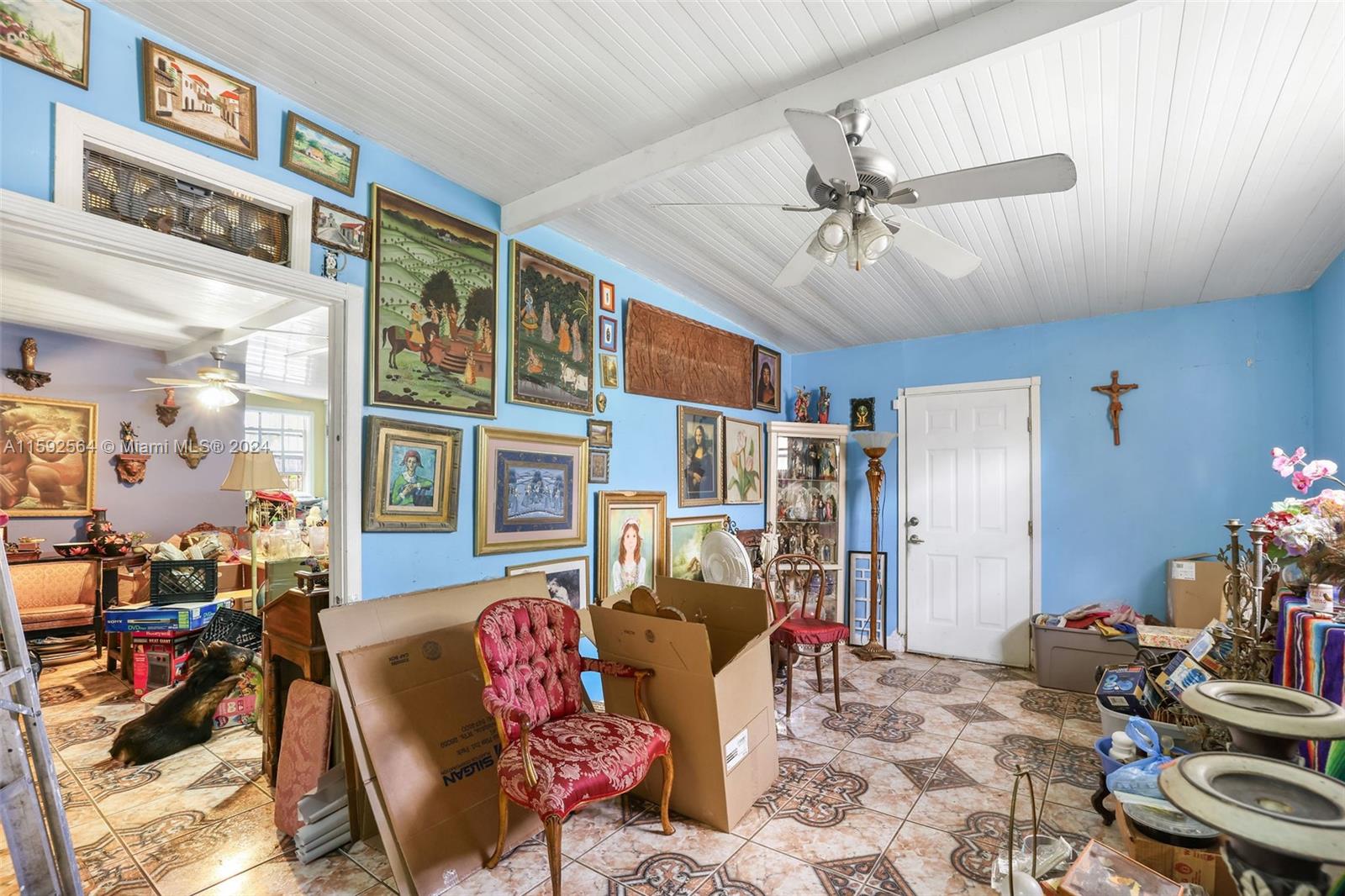 445 Southwest 20th Road Miami, FL 33129 - Photo 9 of 13 a living room with furniture and a rug