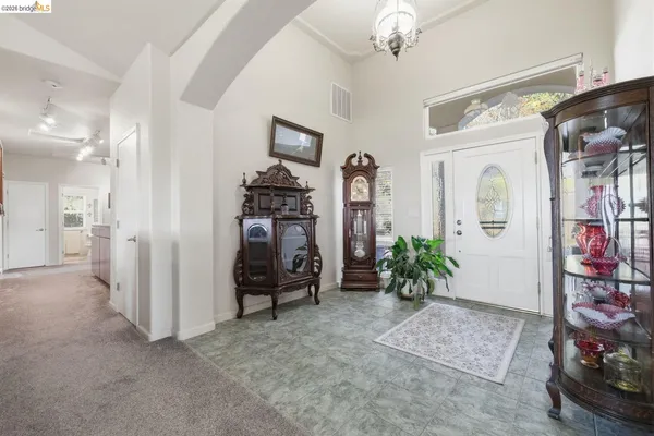 a view of a livingroom with furniture and a livingroom