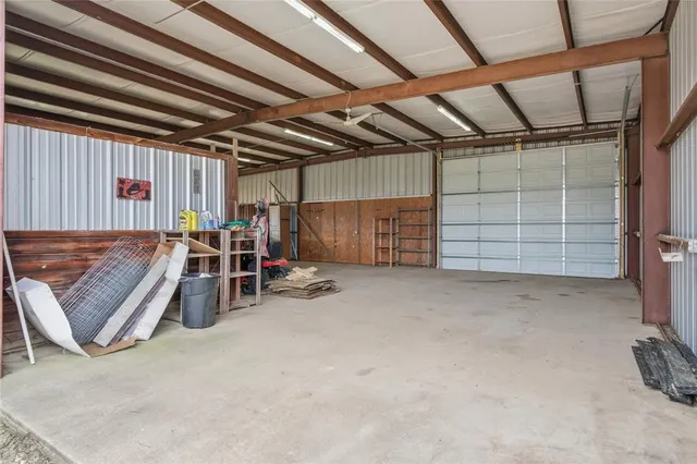 a view of a big room with wooden ceiling
