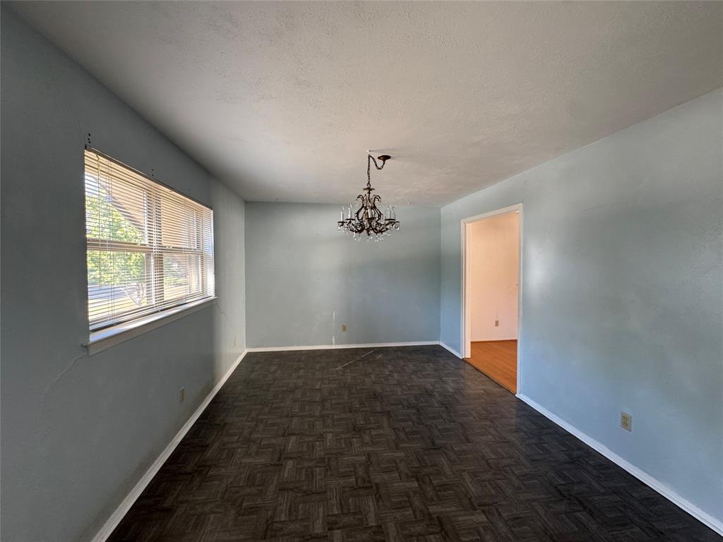 1900 Provincetown Lane Richardson, TX 75080 - Photo 5 of 14 a view of an empty room with windows