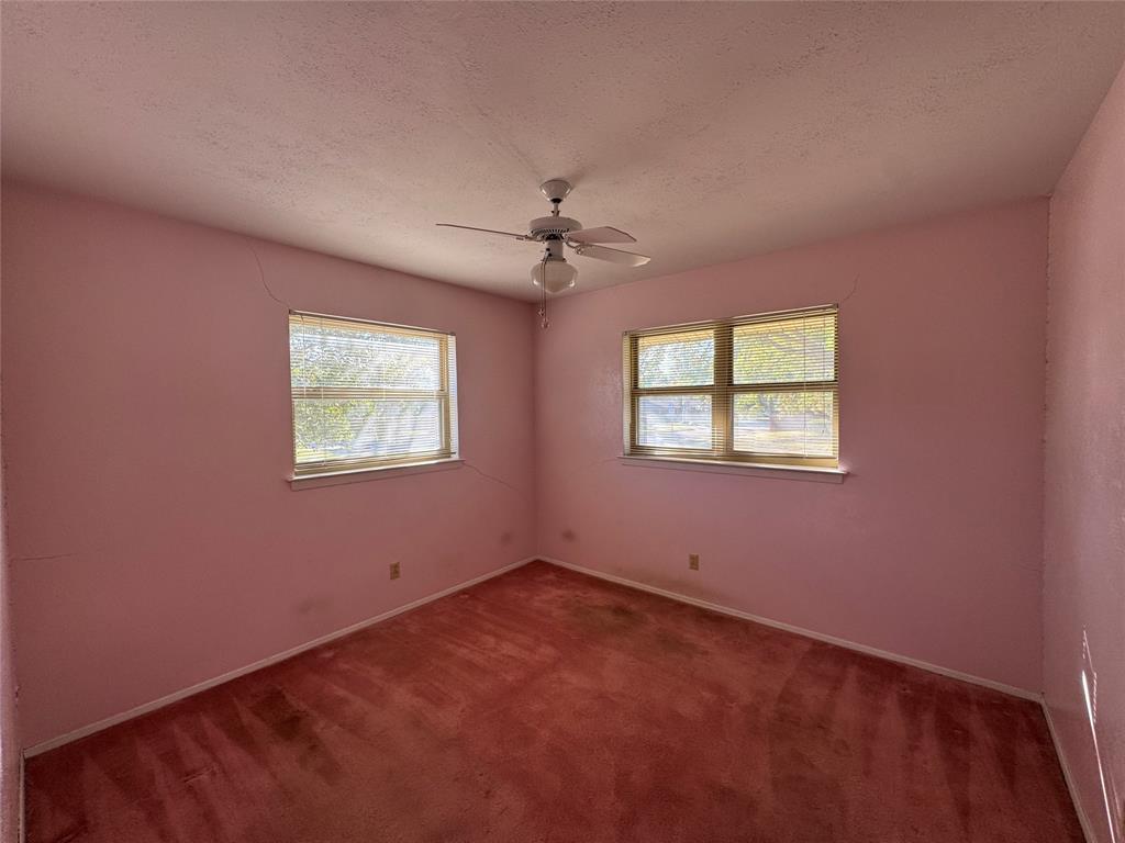 1900 Provincetown Lane Richardson, TX 75080 - Photo 10 of 14 an empty room with a window