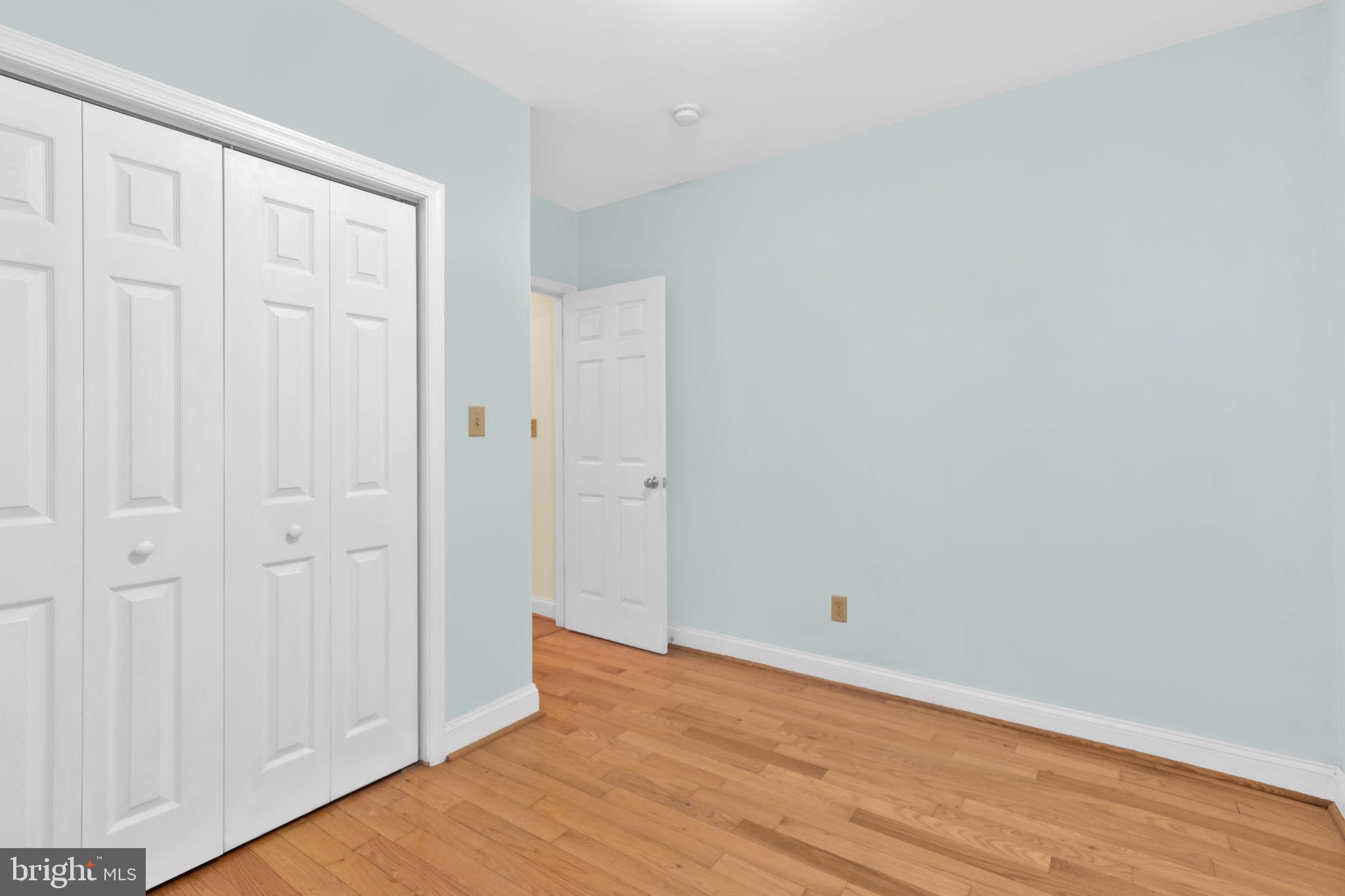 1447 William Street Baltimore, MD 21230 - Photo 15 of 65 a view of an empty room with wooden floor