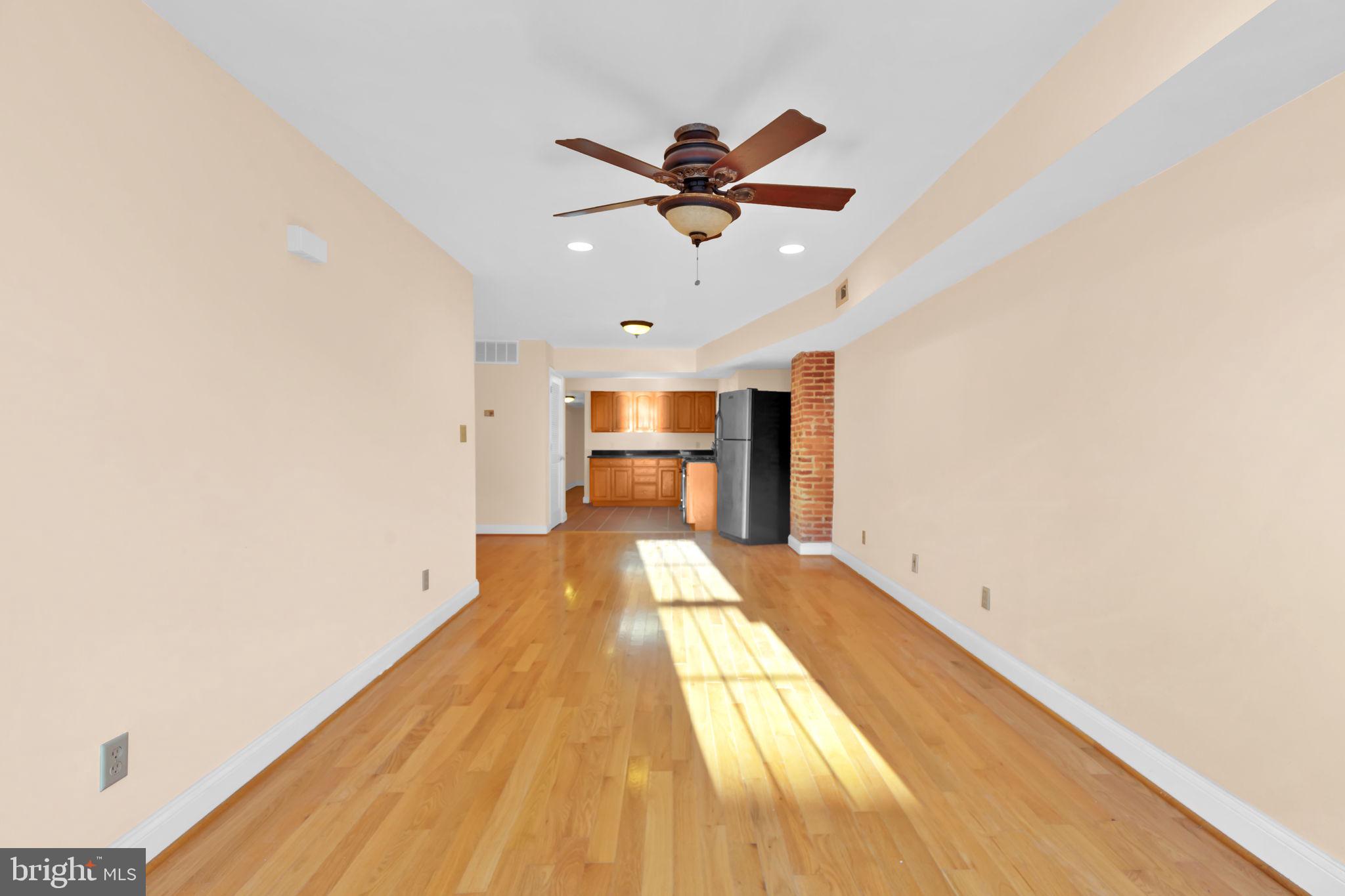 1447 William Street Baltimore, MD 21230 - Photo 23 of 65 a view of a living room with wooden floor