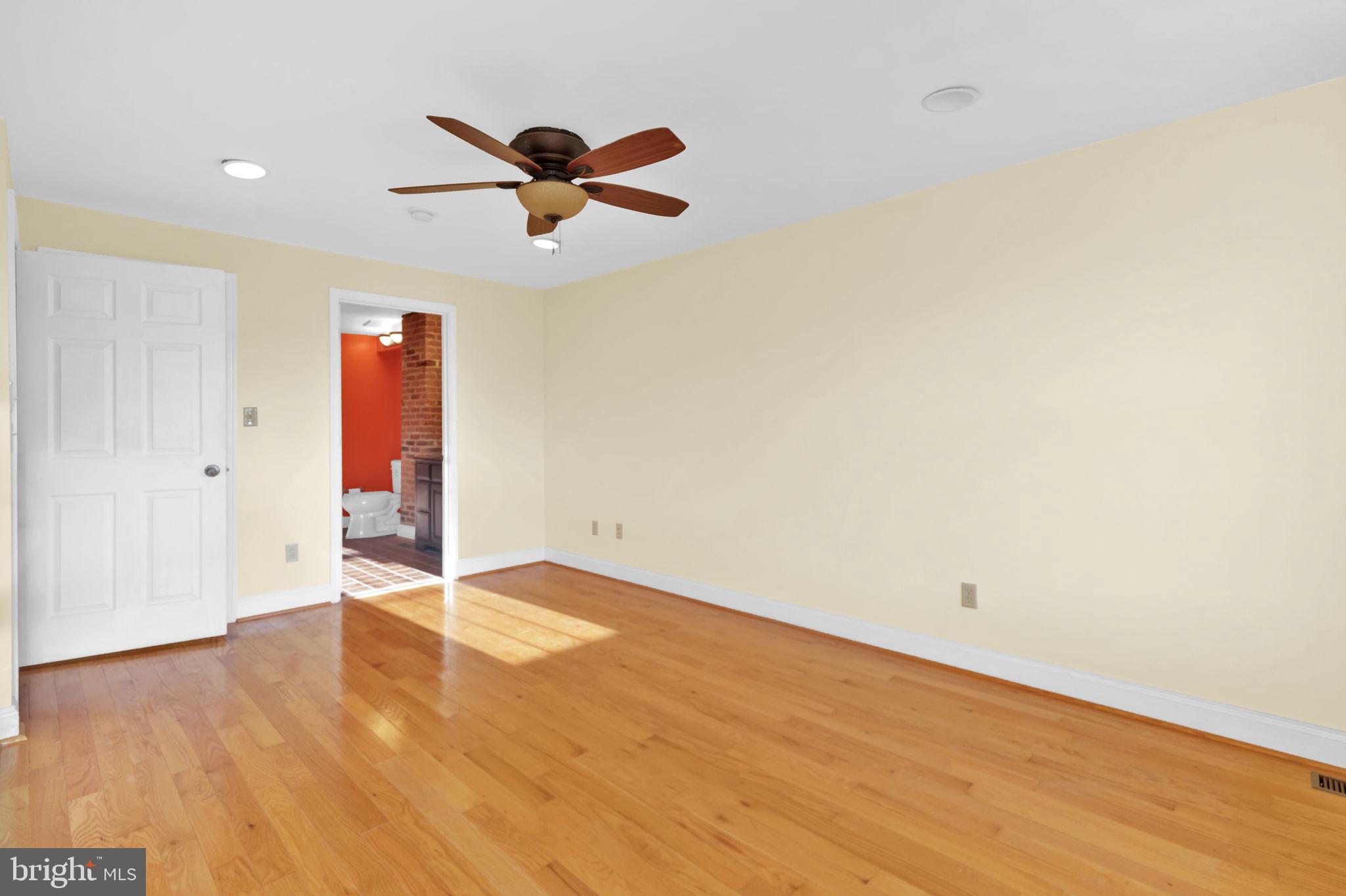 1447 William Street Baltimore, MD 21230 - Photo 31 of 65 a view of empty room with wooden floor