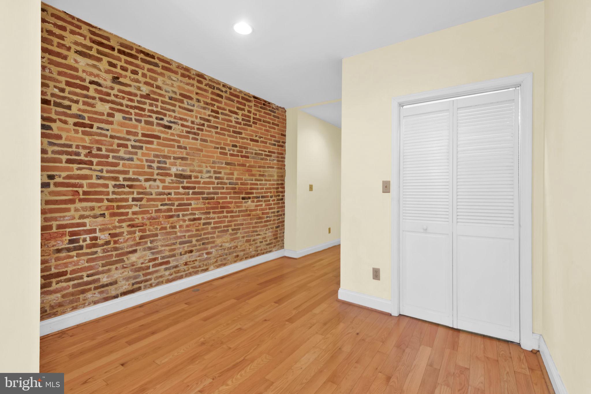 1447 William Street Baltimore, MD 21230 - Photo 6 of 65 a view of empty room with wooden floor