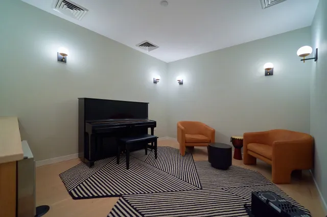 a view of a wooden deck with a yard