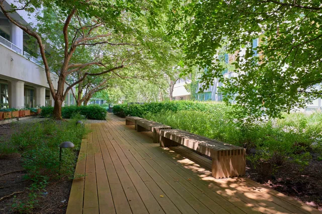 a kitchen with refrigerator a stove a sink and a refrigerator