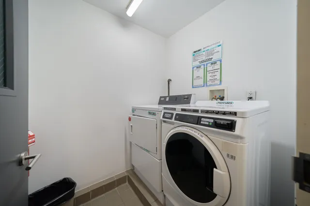 a room with a book shelf and a bookshelf