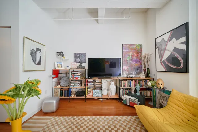 a bathroom with a shower and a sink