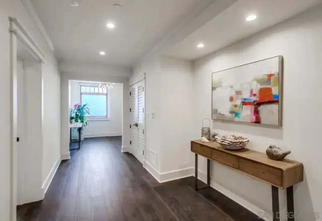 a bathroom with a bathtub and a sink